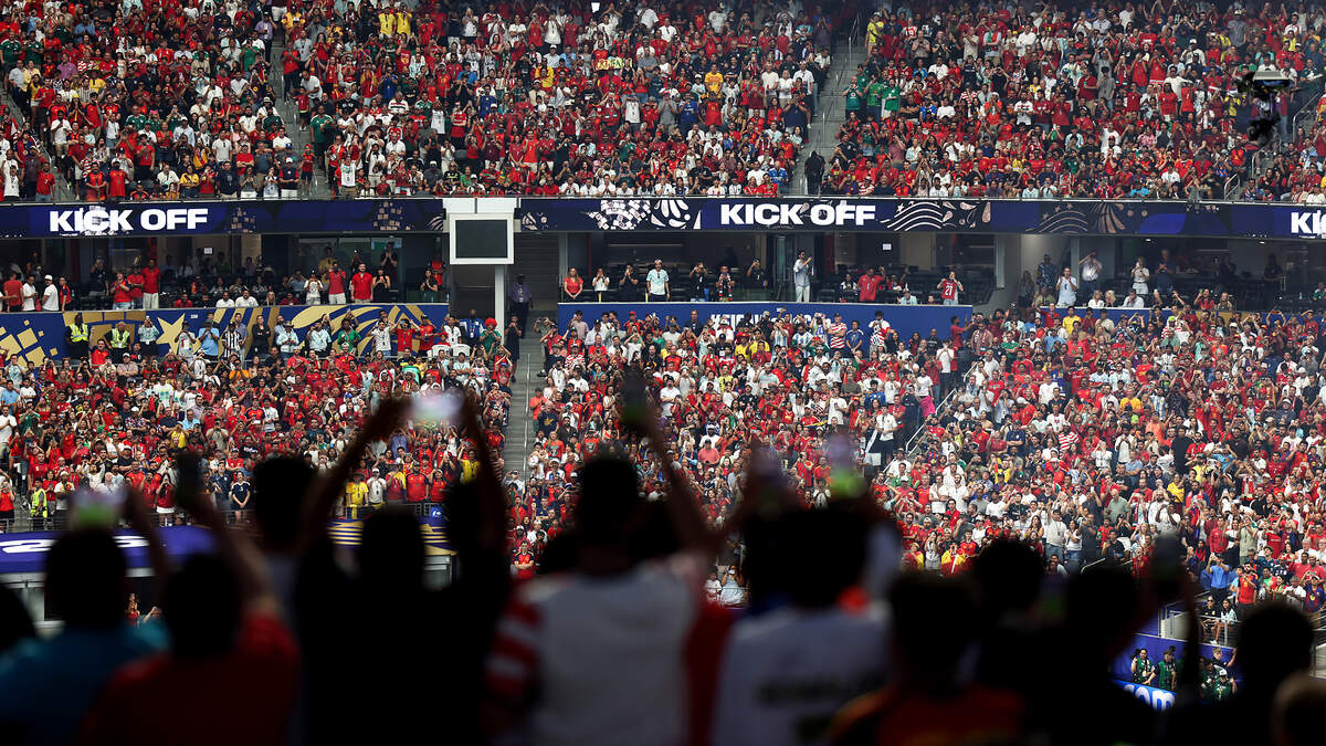 A full Dallas Stadium erupts into cheers as the Portugal and Spain teams take the field in the 2026 FIFA World Cup round of 16 match on Monday, July 6, 2026, at Dallas Stadium in Arlington.